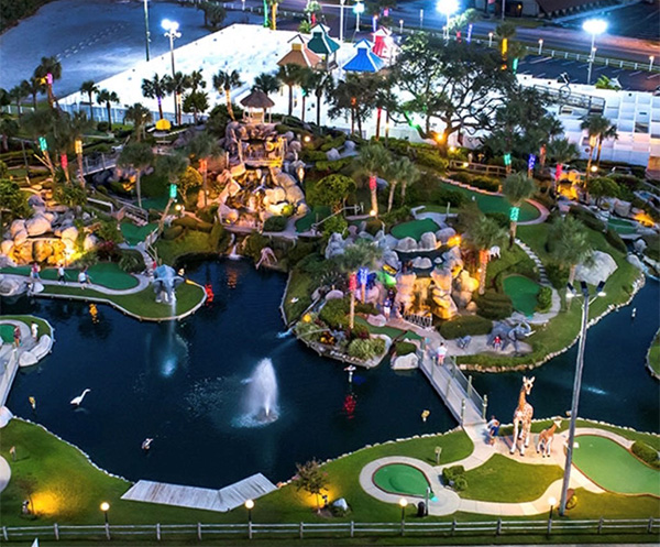 Aerial view of Coconut Creek Fun Park at dusk on mobile